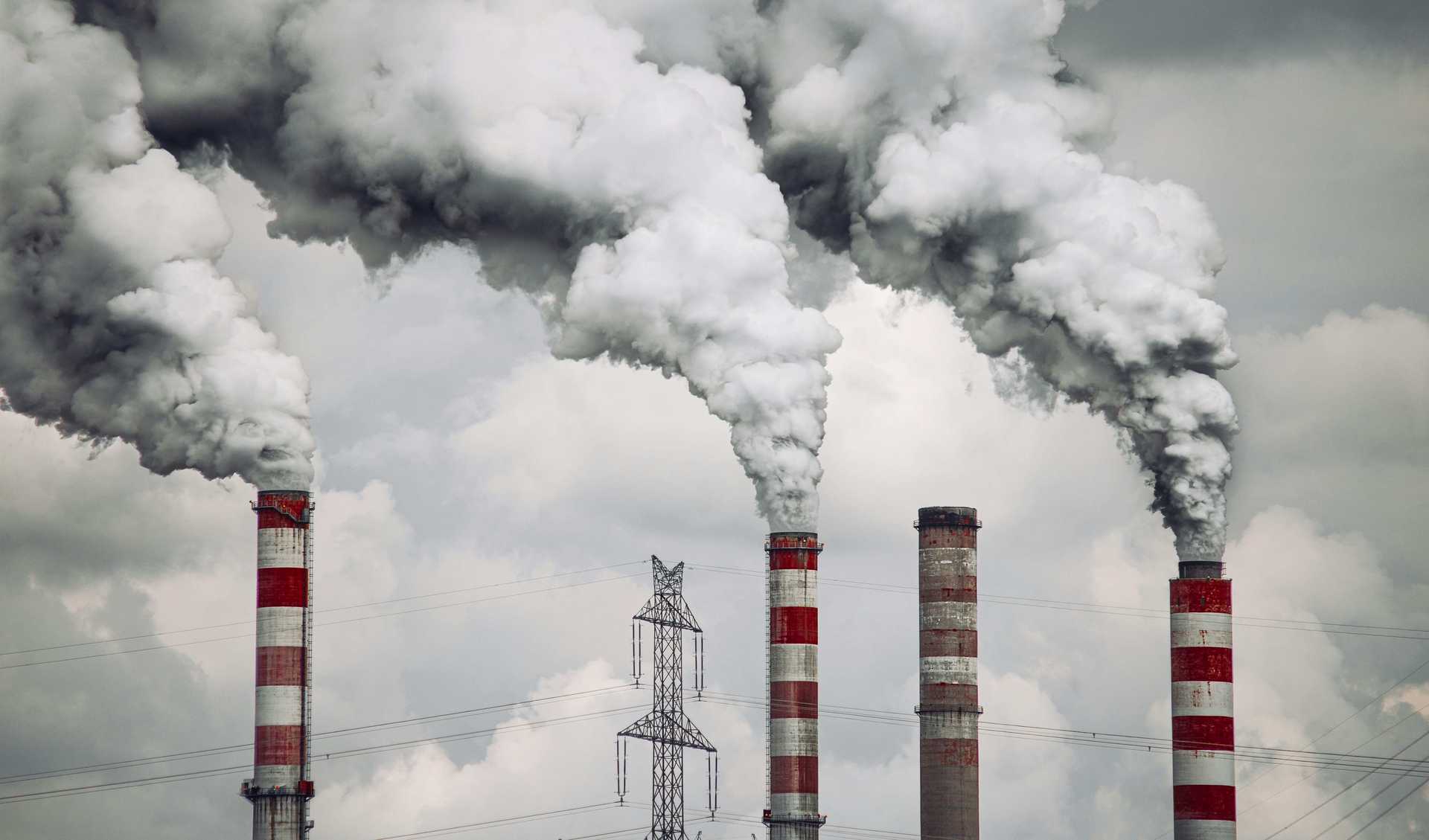 Smoking industrial chimneys in Poland pollute the air