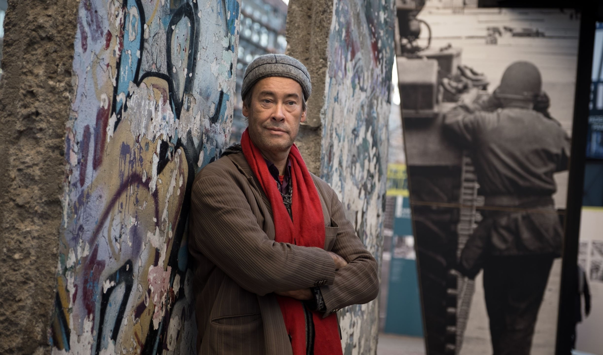Thomas Krüger standing in front of a wall in Berlin
