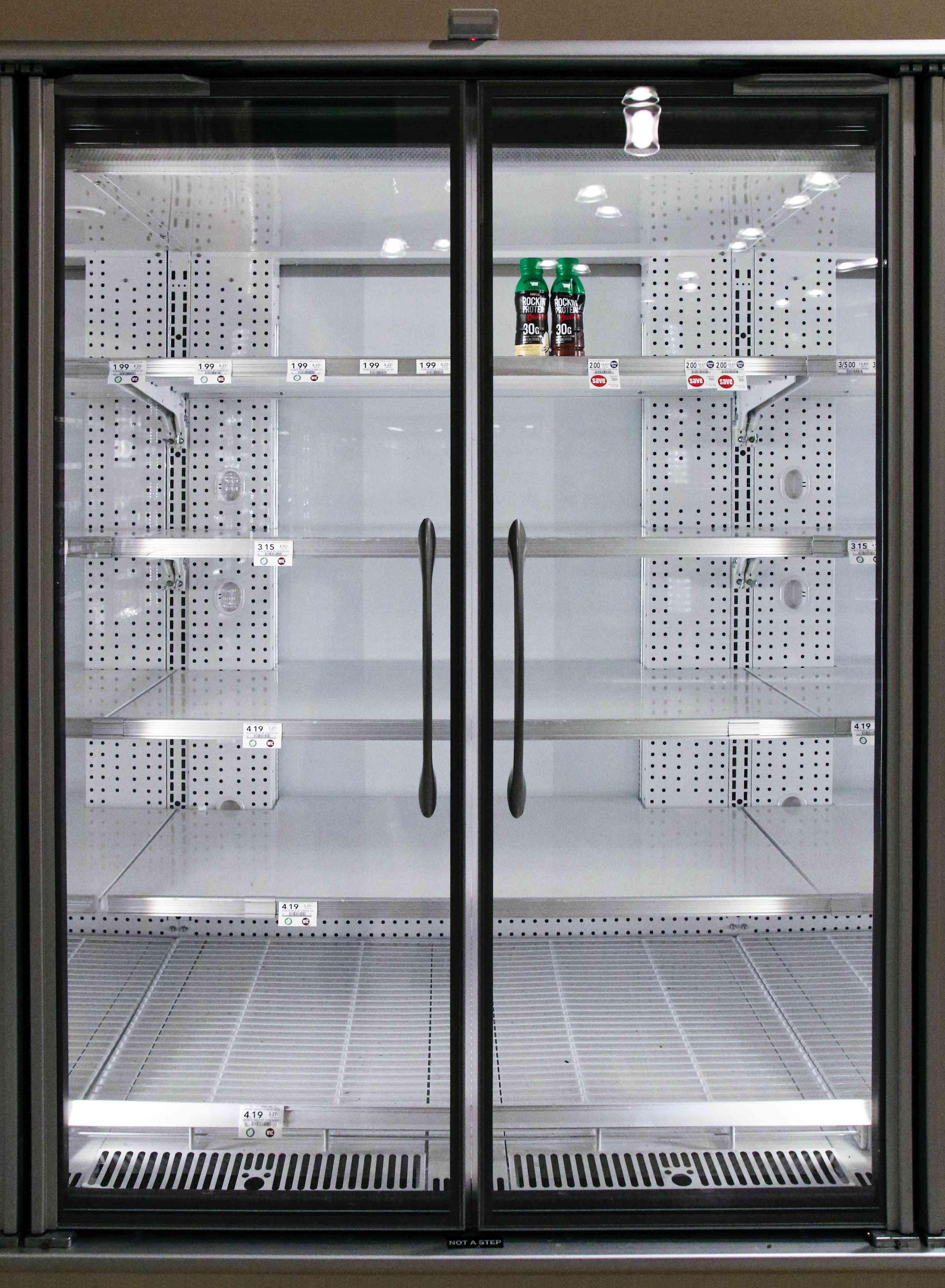 An nearly empty big fridge