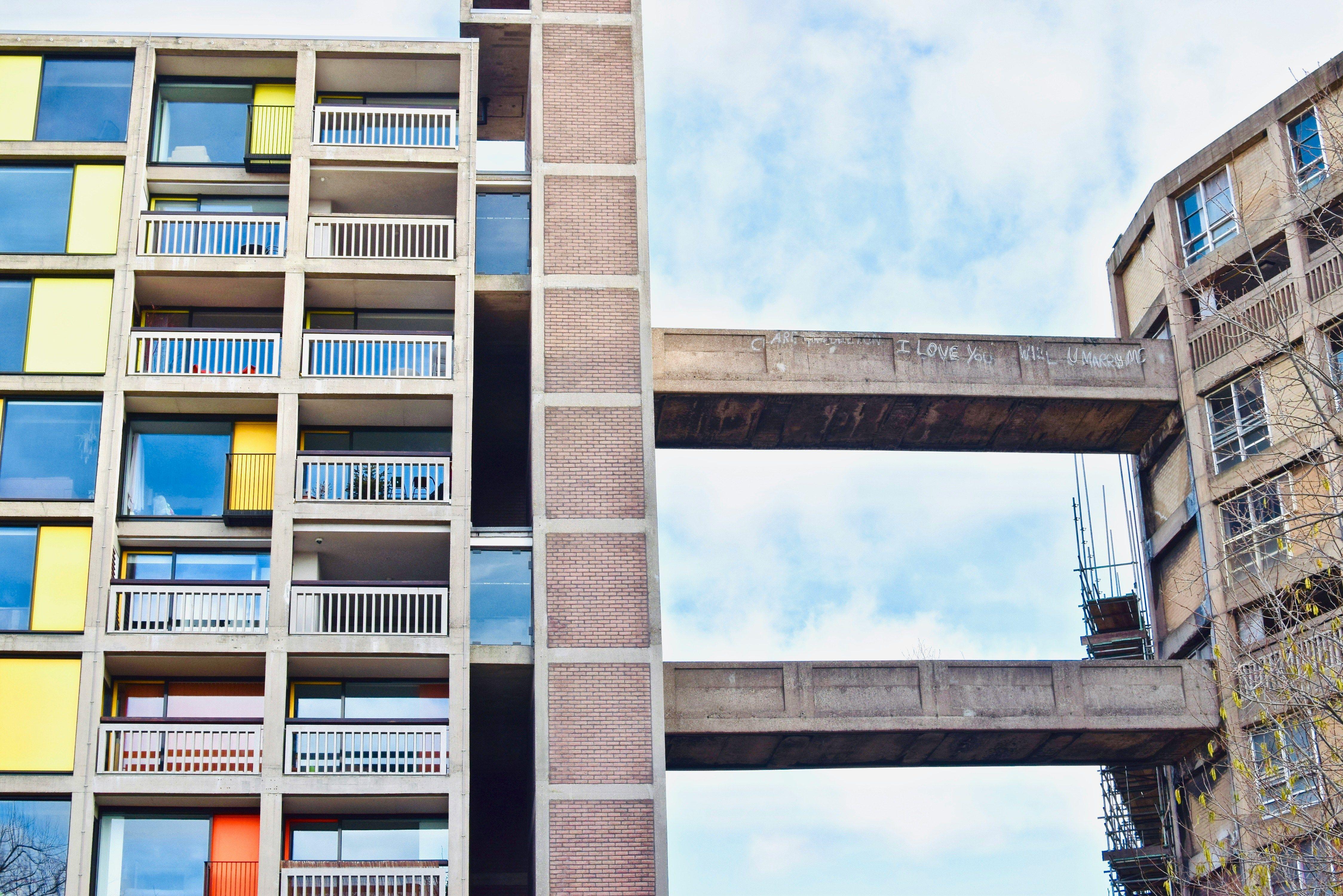 Two buildings are connected by two small bridges.