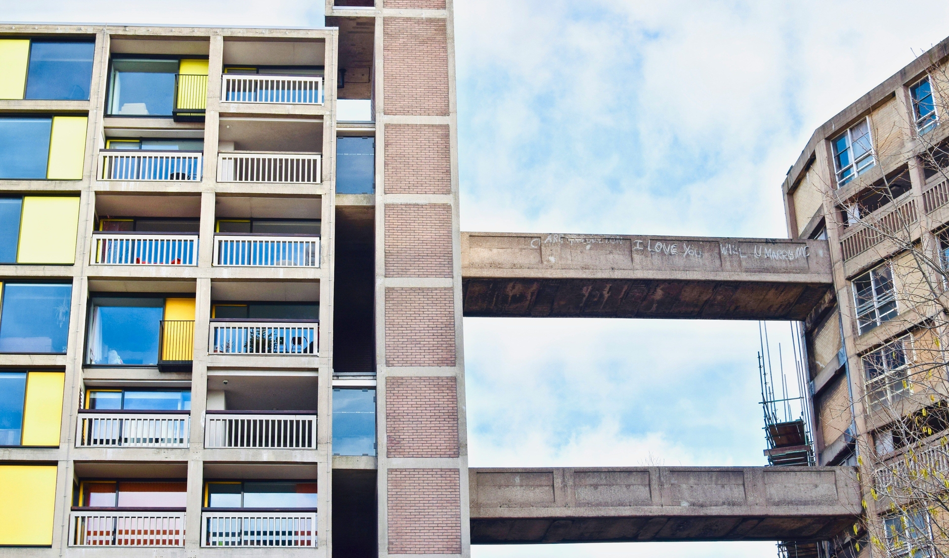 Two buildings are connected by two small bridges.