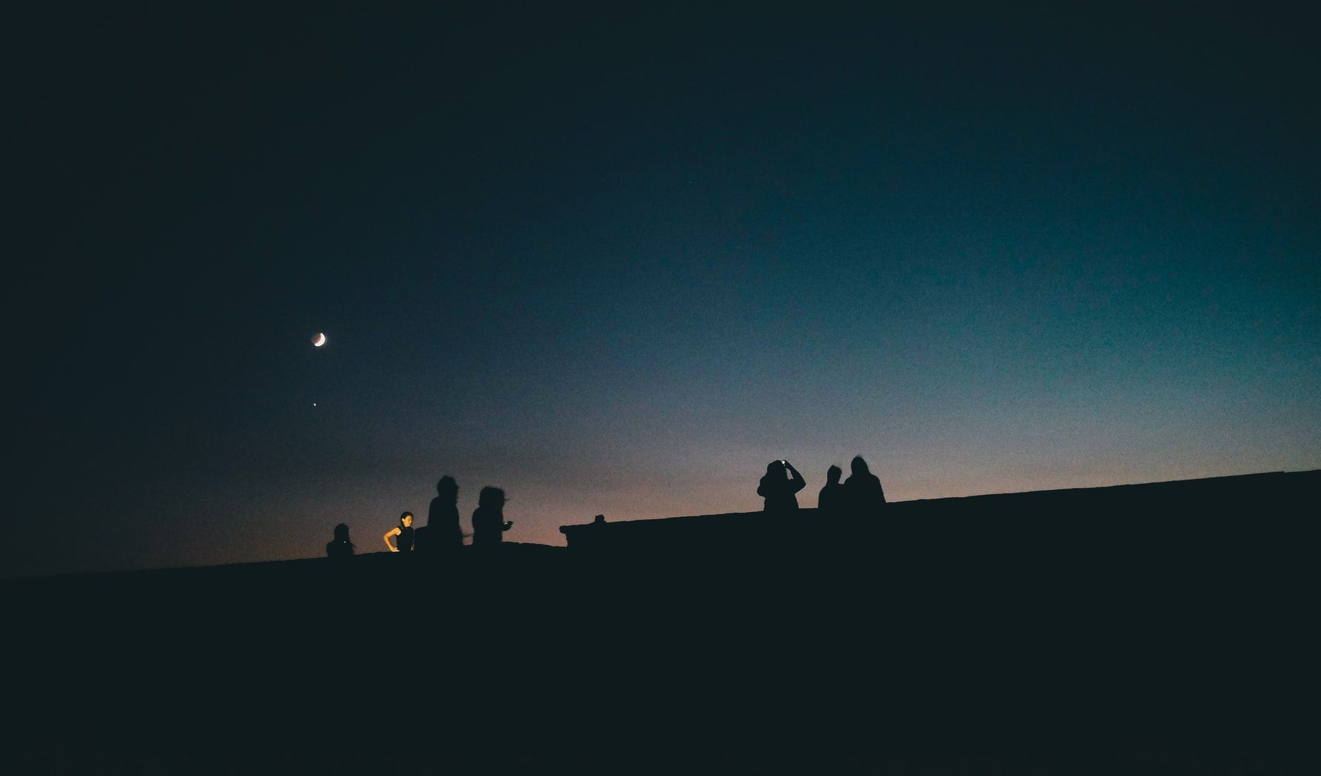 Silhouette of people under clear sky during dusk in Prizren, Kosovo