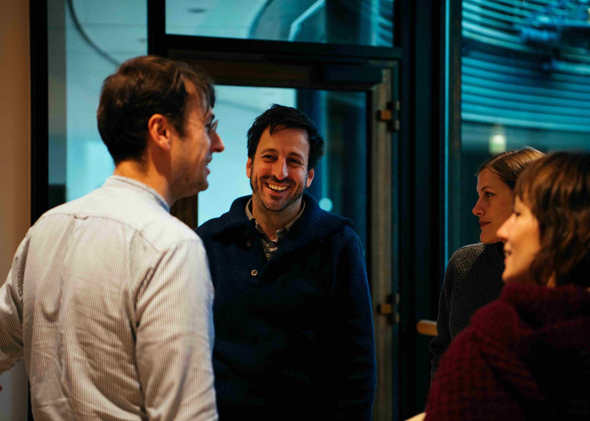  A group of people is talking to each other and is enjoying the moment